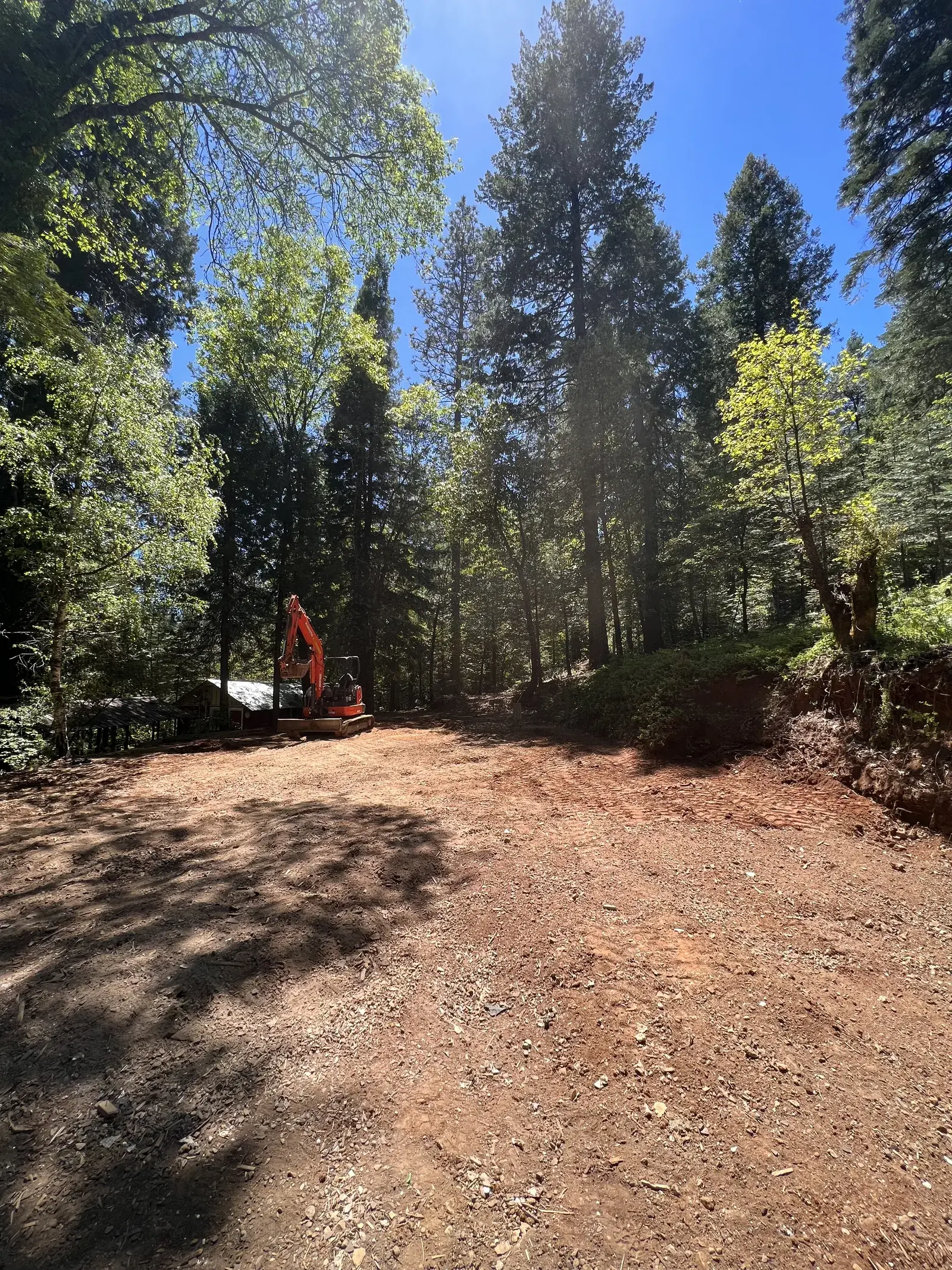 Cleared and graded pad in Magalia ready for rebuild after fire damage demolition